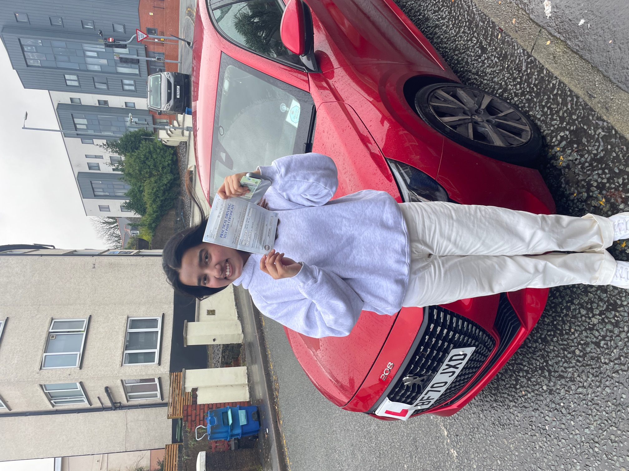 Pupil celebrating passing their driving test