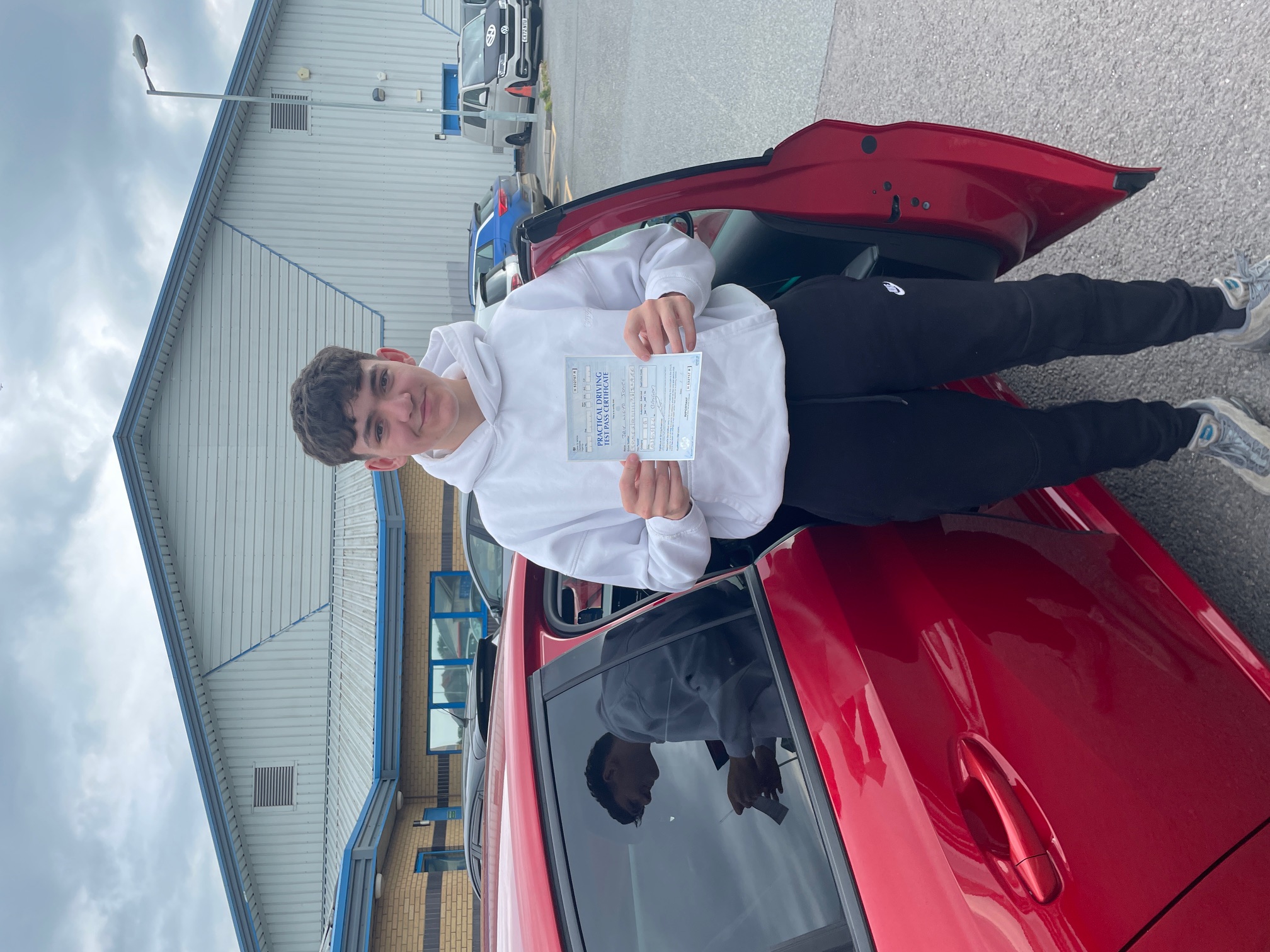 Pupil celebrating passing their driving test